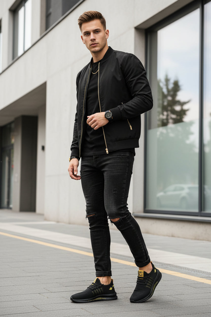 Black athletic shoes with yellow accents on a dark background