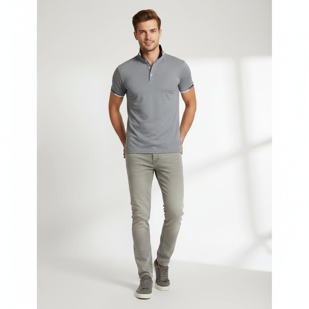 Gray polo shirt with navy accents on a white background