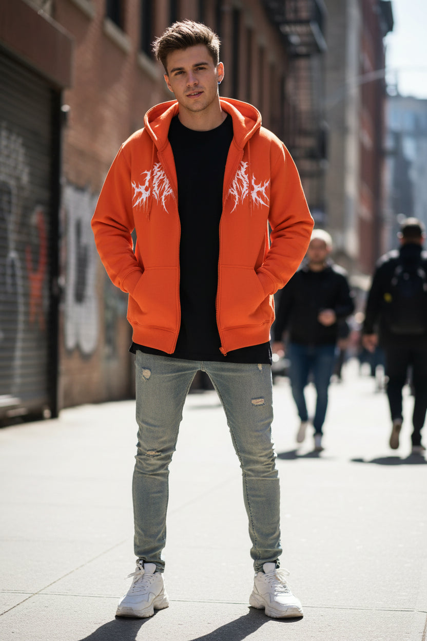 Orange hoodie with white graphic design on a white background