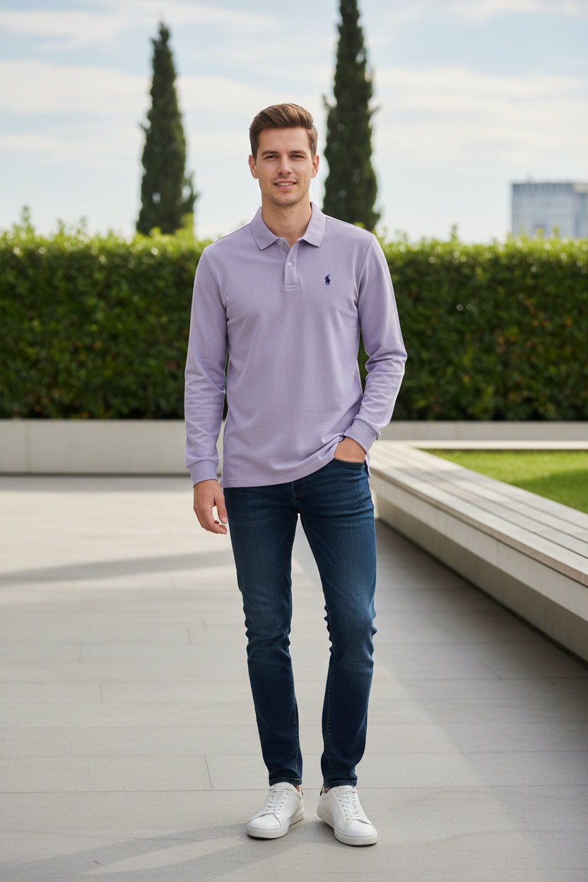 Purple long-sleeve polo shirt on a hanger with other shirts in the background