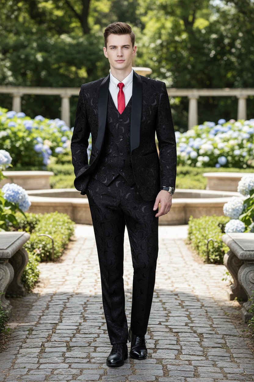 Black patterned suit with a red tie on a white background