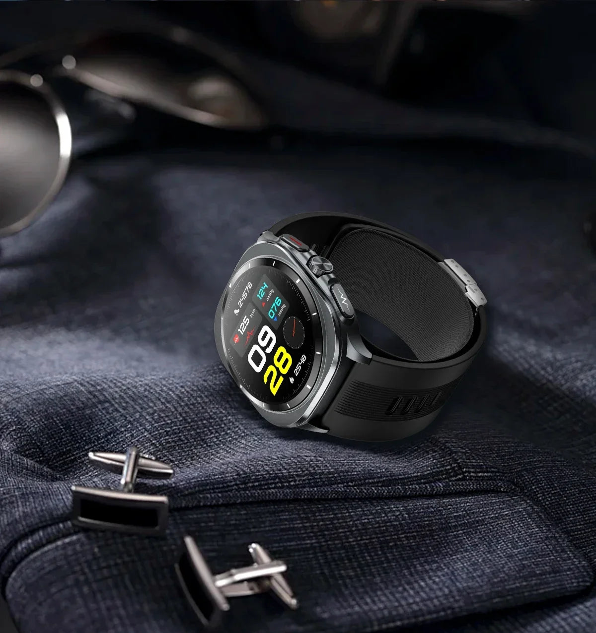 Smartwatch on a dark fabric surface with cufflinks