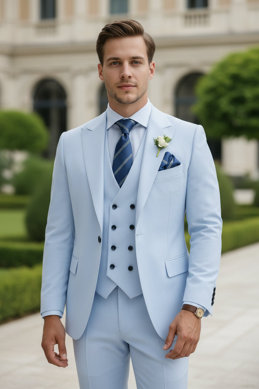 Light blue suit with a striped tie and boutonniere on a white background