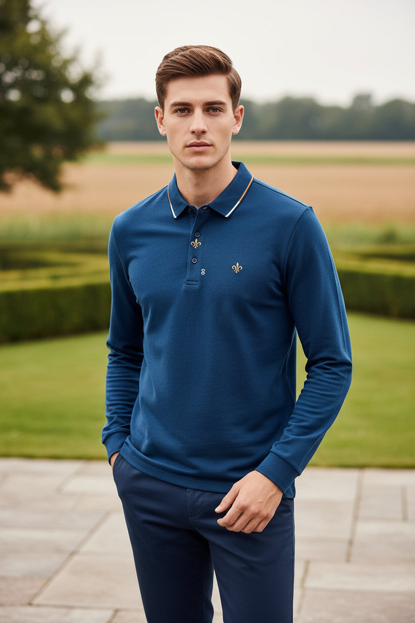 Blue long-sleeve polo shirt on a hanger against a plain background