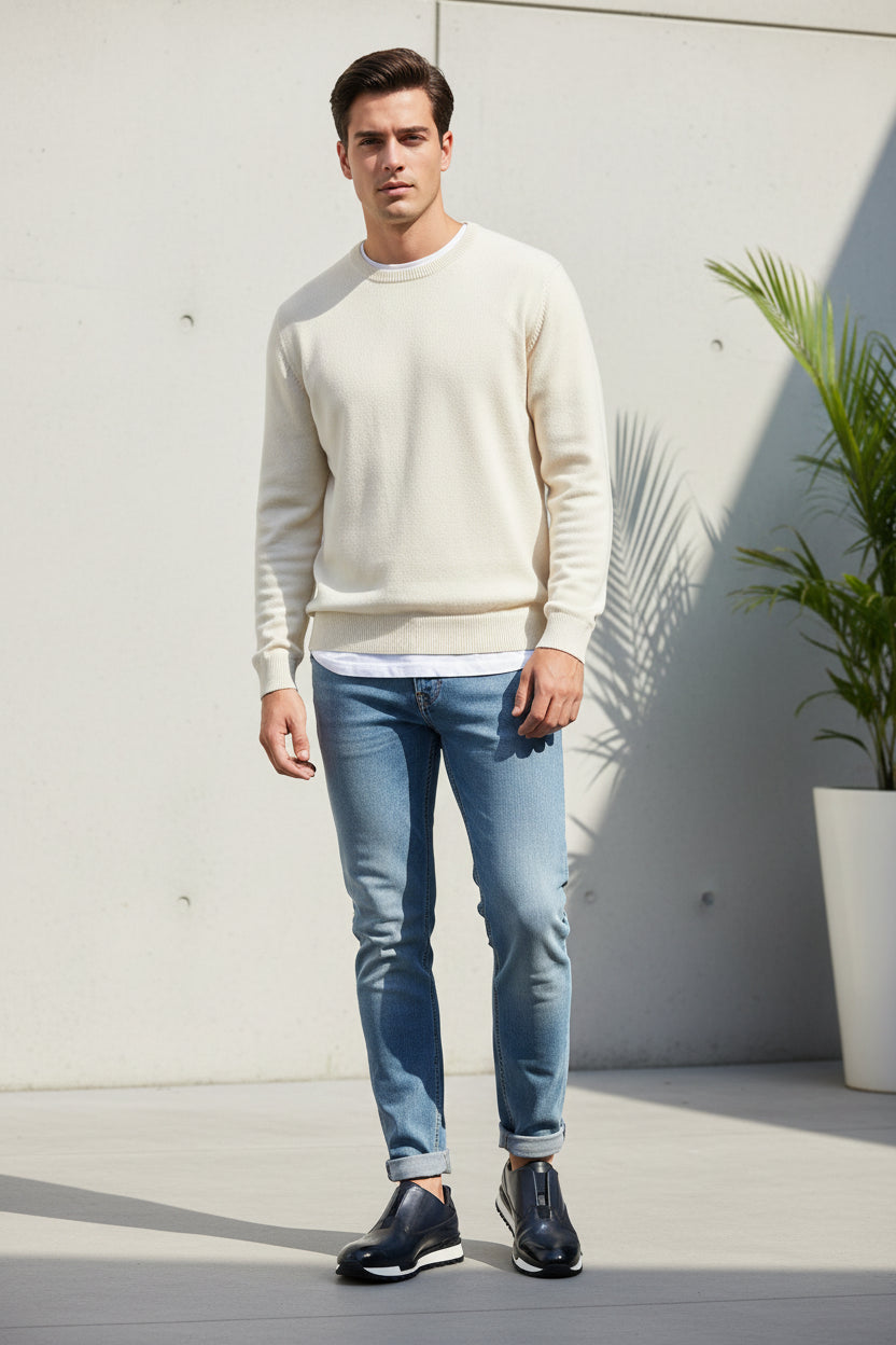 Pair of navy blue shoes with white soles on a light gray background
