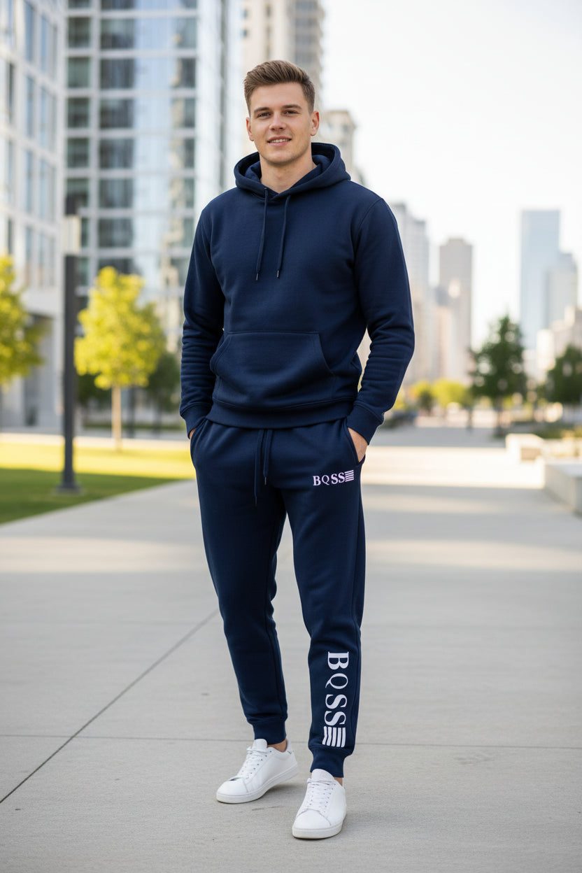 Navy blue tracksuit with 'BQSS' branding on a white background