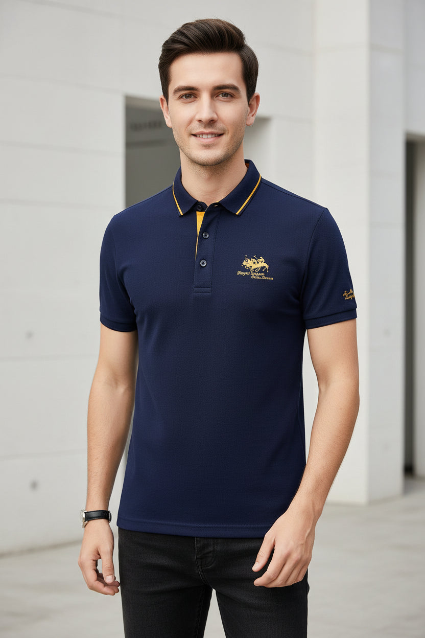 Blue polo shirt with yellow accents and brand logo on a gray background