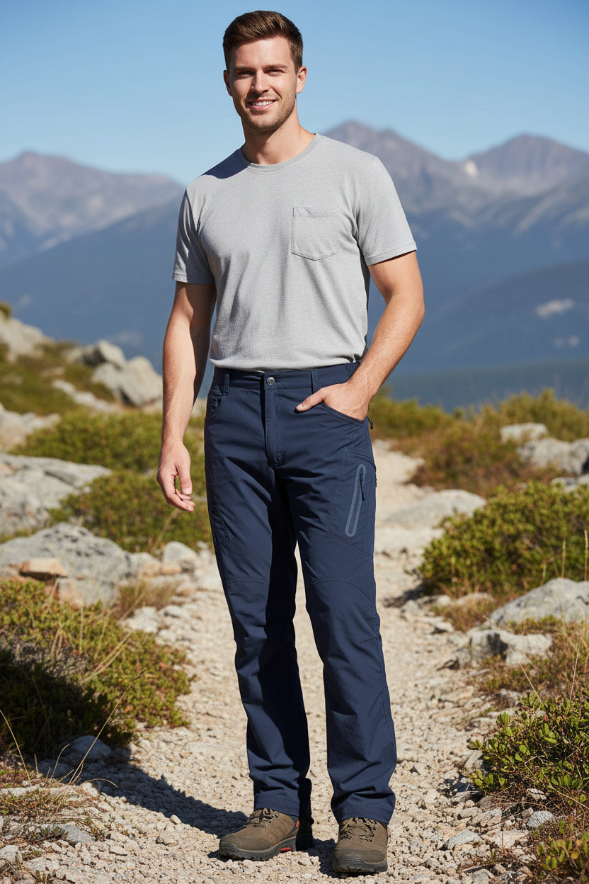 Navy blue pants worn by a person on a white background