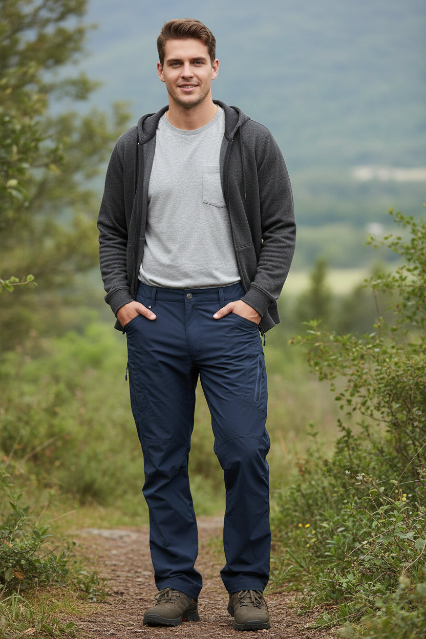Navy blue pants worn by a person on a white background