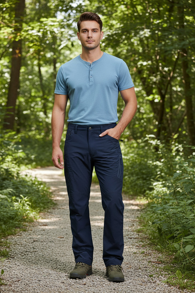 Navy blue pants worn by a person on a white background