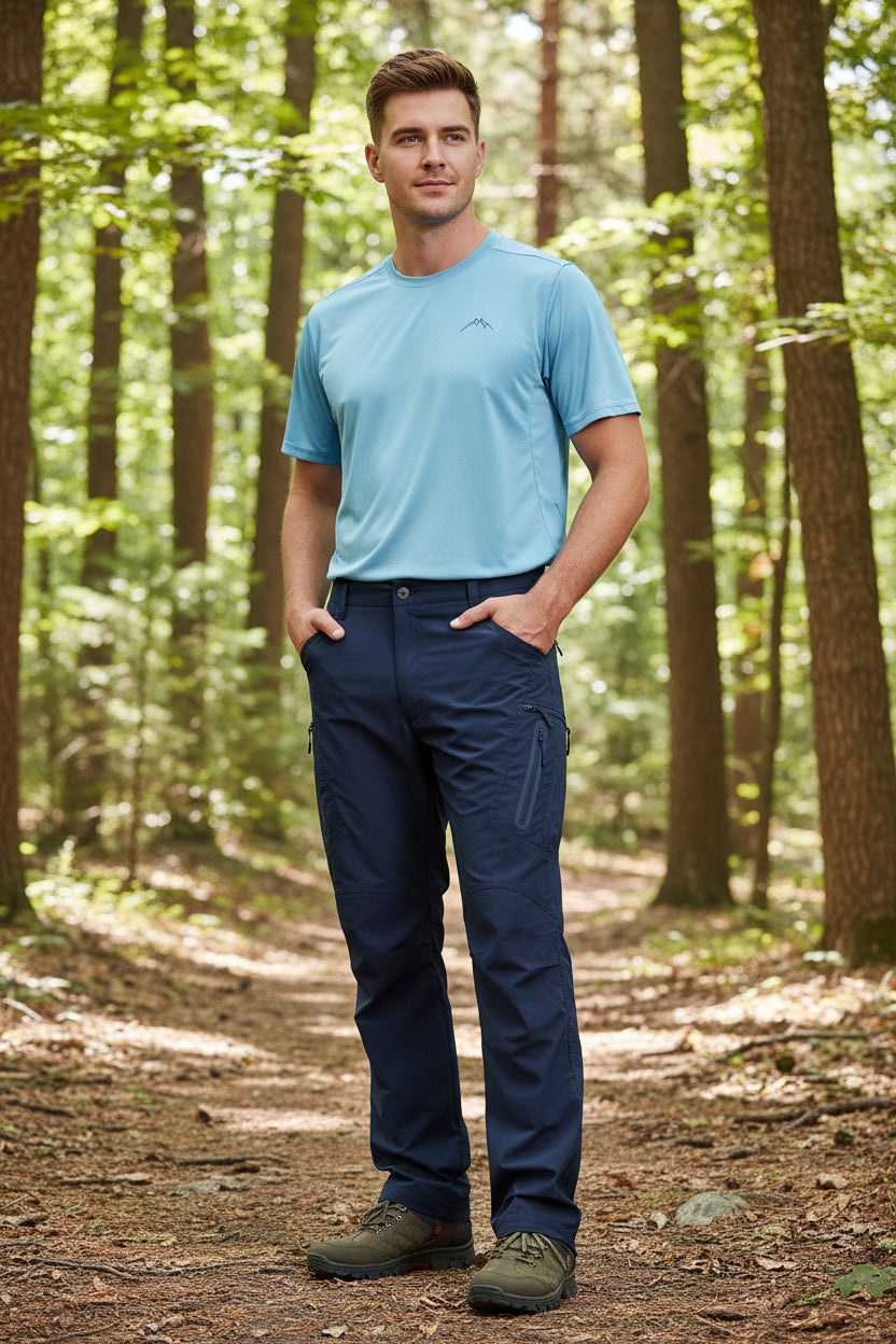 Navy blue pants worn by a person on a white background