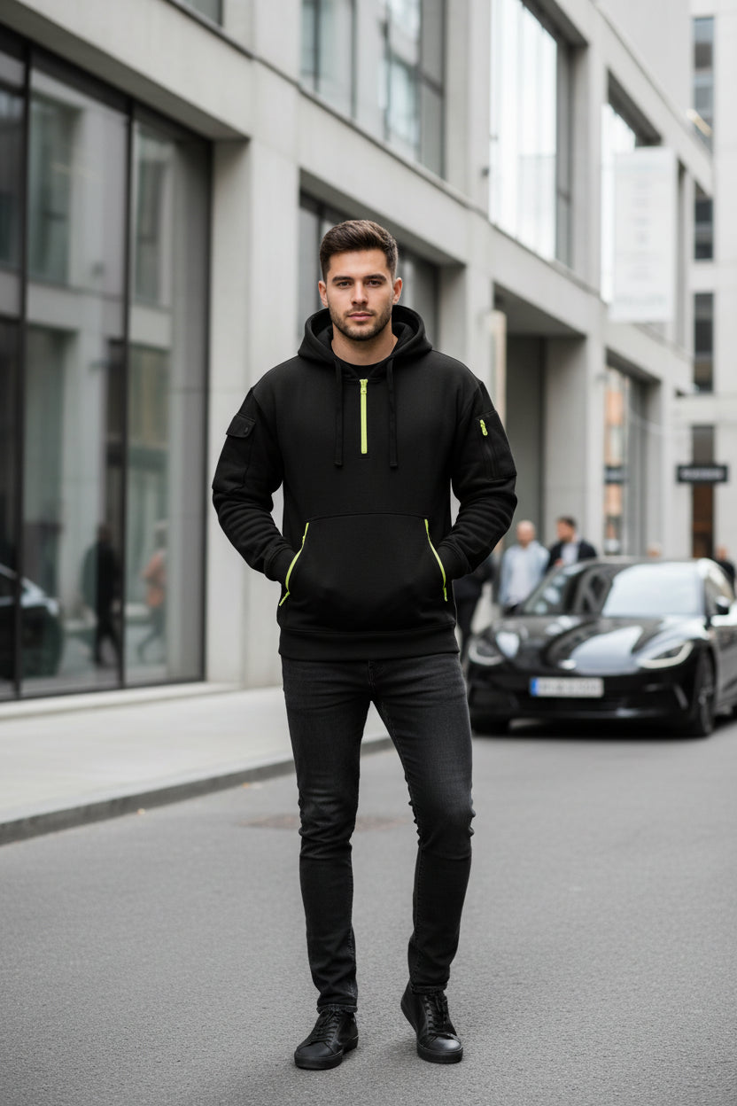 Black hoodie with yellow zippers on a white background