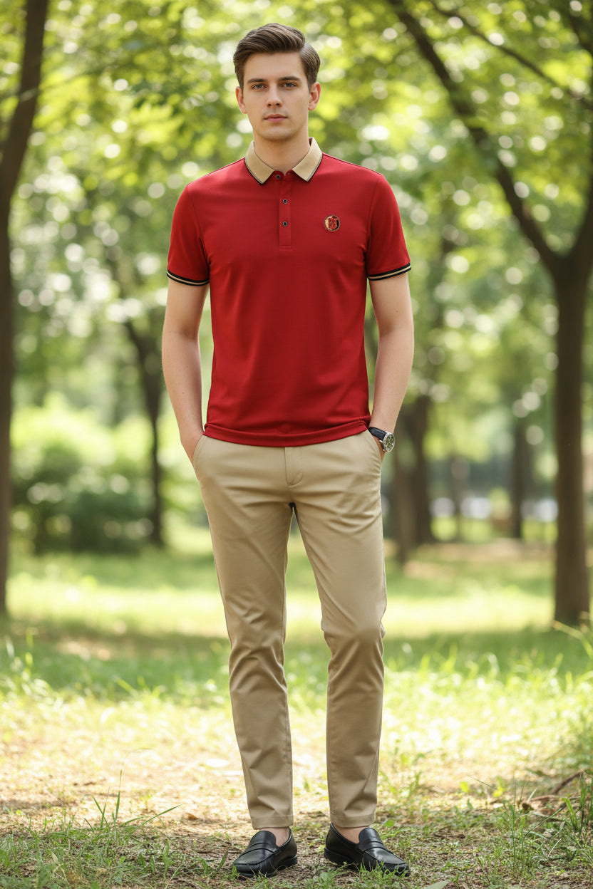 Red polo shirt with a logo on a gray background