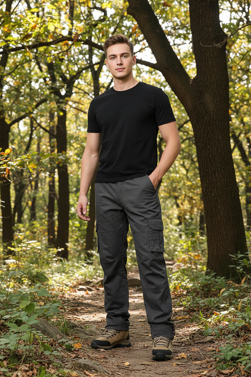 Gray cargo pants worn by a person on a white background