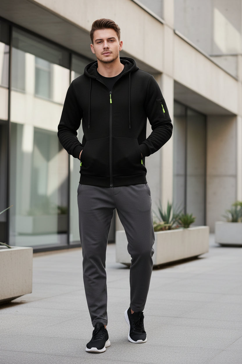 Black hoodie with green accents on a white background
