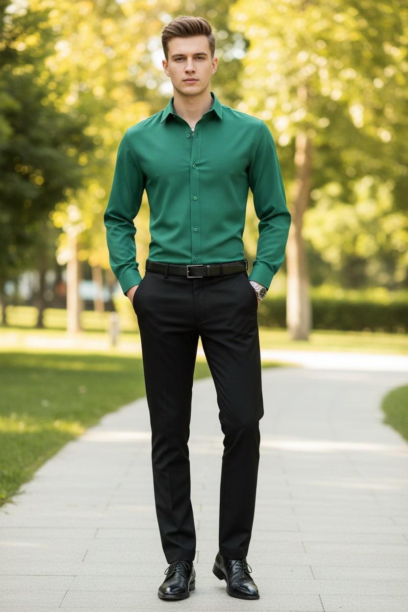 Person wearing a green shirt and black pants in a store setting