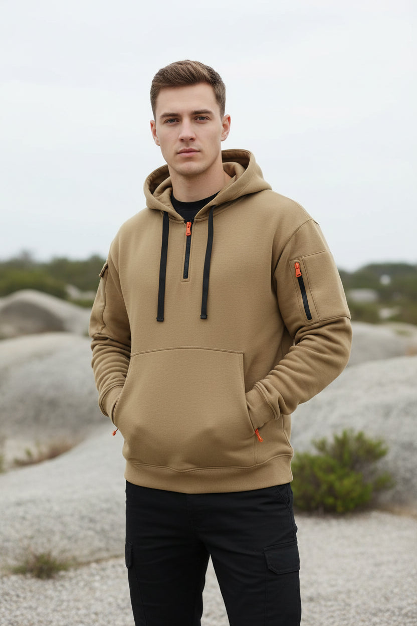 Beige hoodie with black and orange accents on a white background