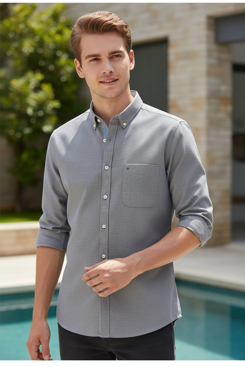 Gray shirt with blue collar on a white background
