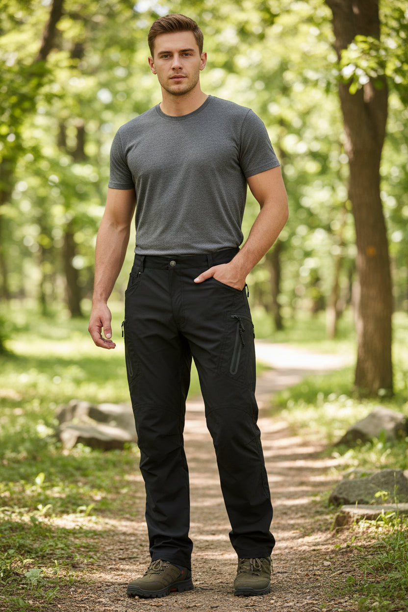 Person wearing black pants on a white background