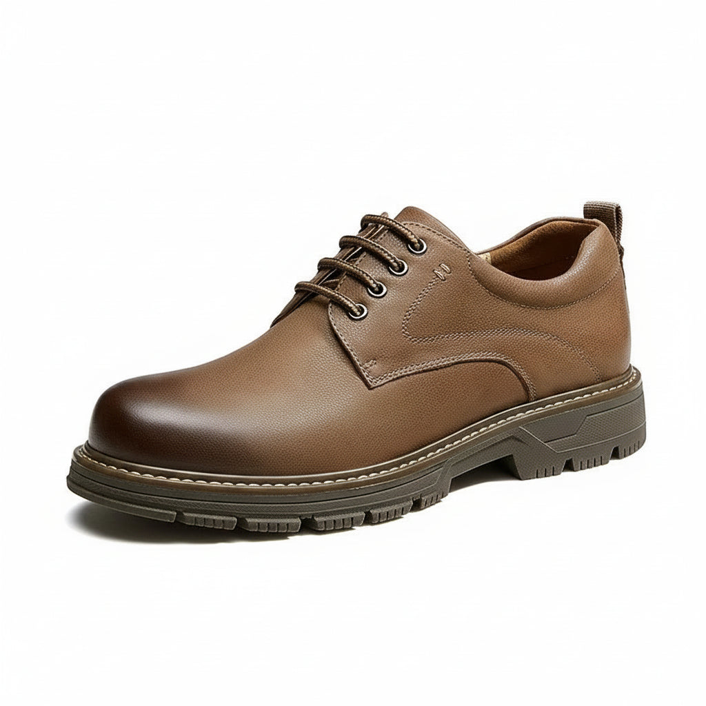 Brown leather shoe on a white background