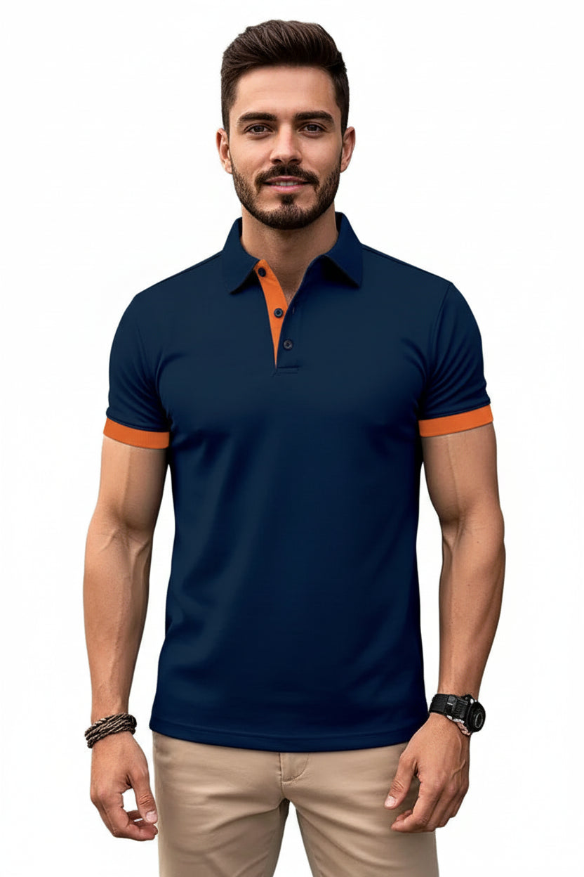Man wearing a navy blue polo shirt with orange accents on a white background