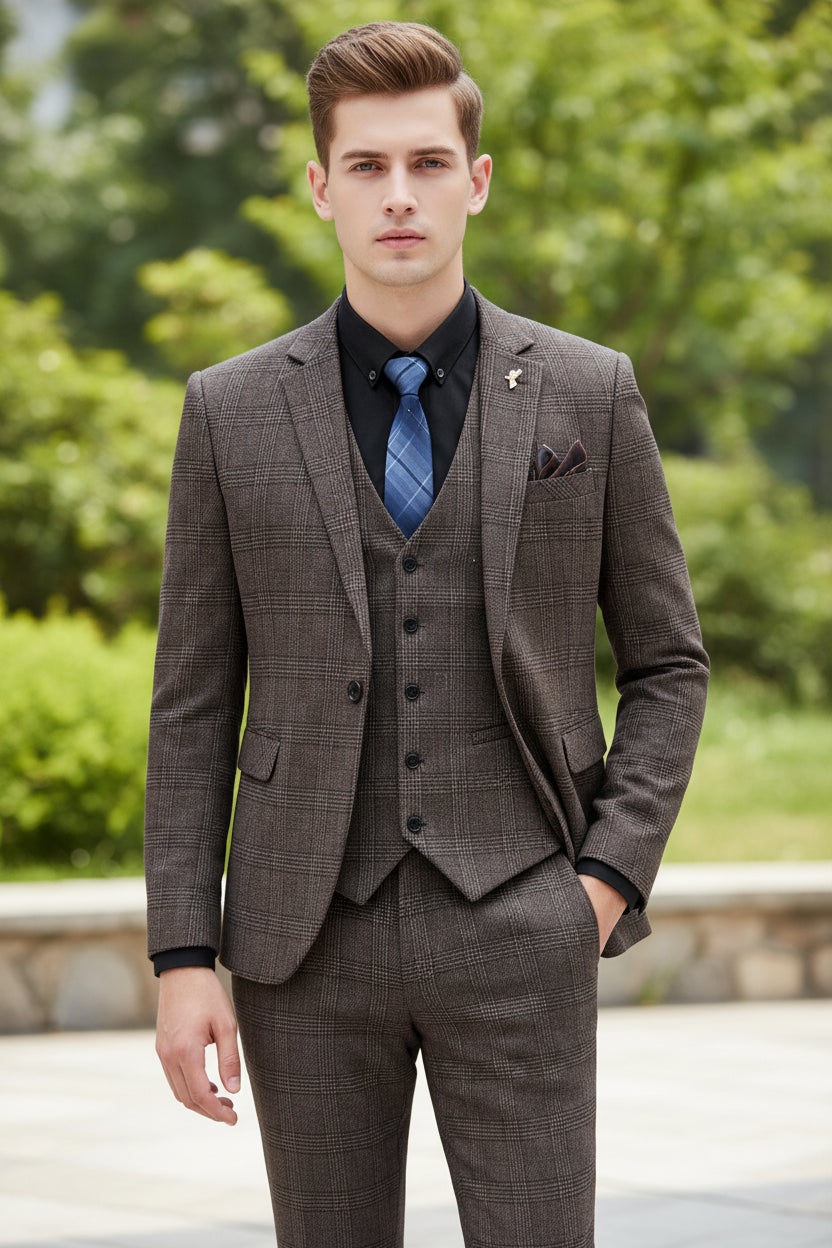 Person wearing a brown checkered suit in a kitchen setting