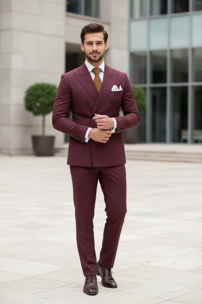 Maroon suit with a brown tie and white shirt on a white background