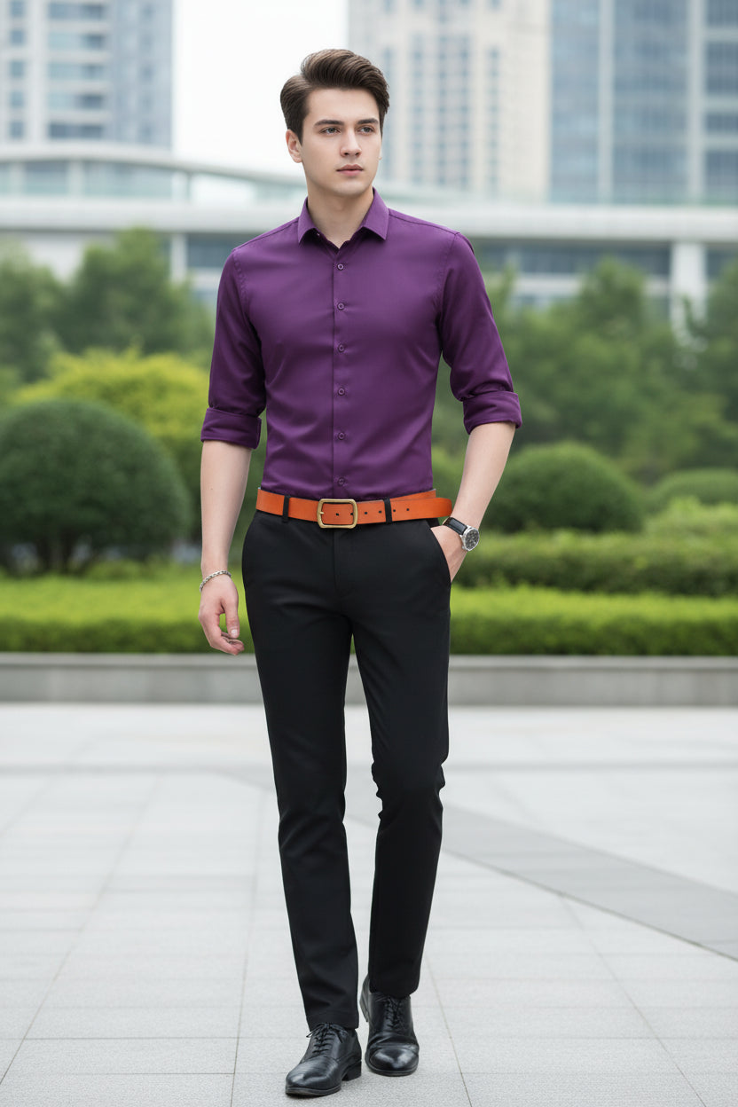 Purple shirt worn by a person on a gray background