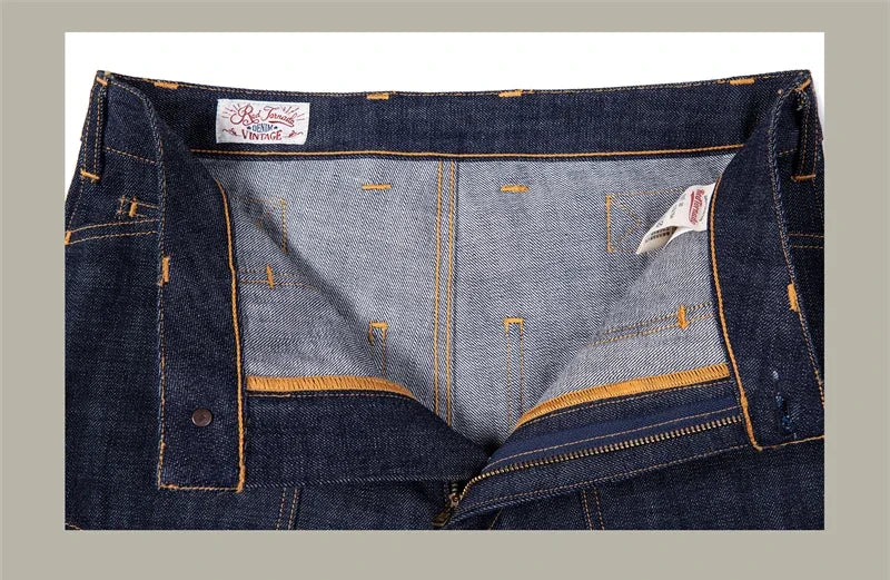 Close-up of a pair of blue jeans with visible stitching and brand labels.