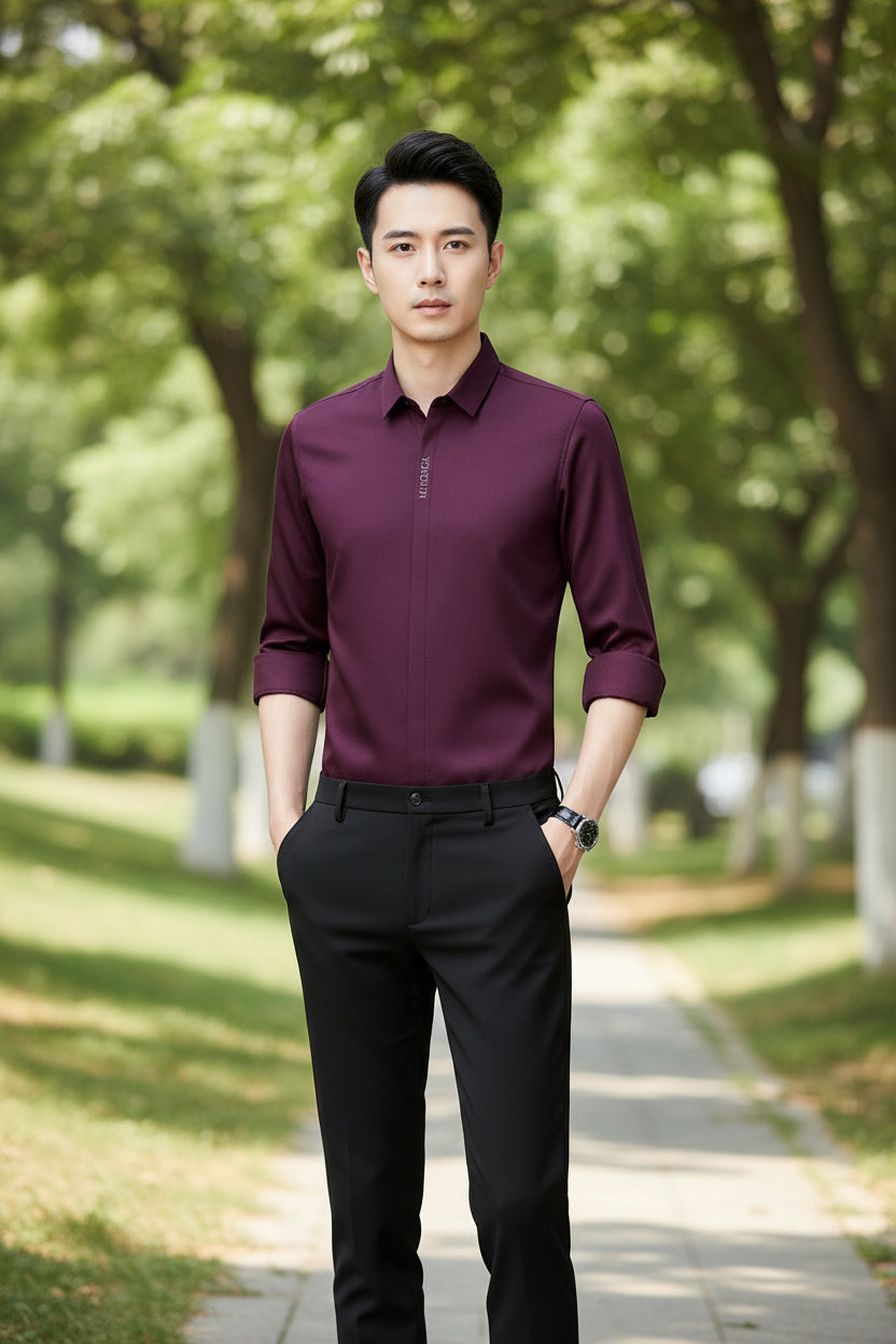 Purple dress shirt with rolled-up sleeves on a gray background