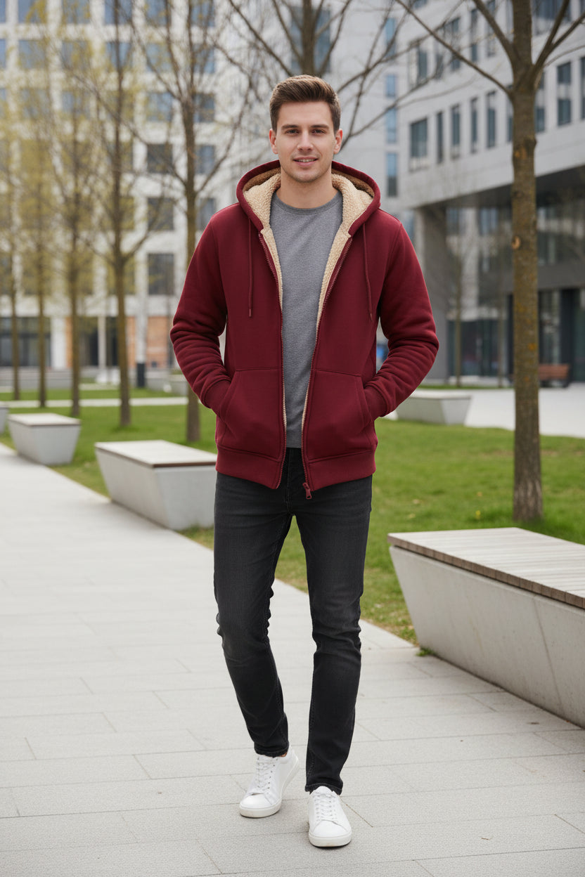 Red hoodie with beige lining on a white background