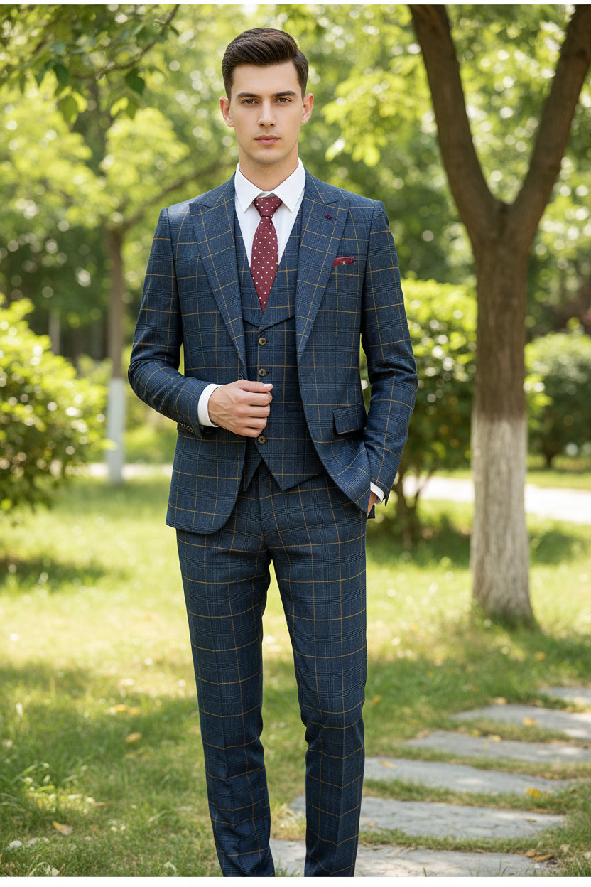 Blue checkered suit on a mannequin against a brown curtain background