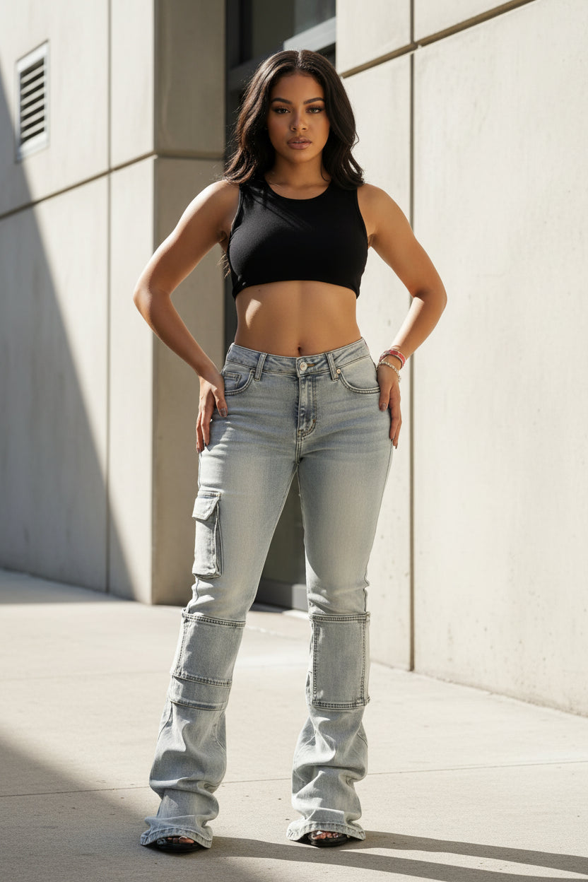 Person wearing light blue jeans in an urban setting