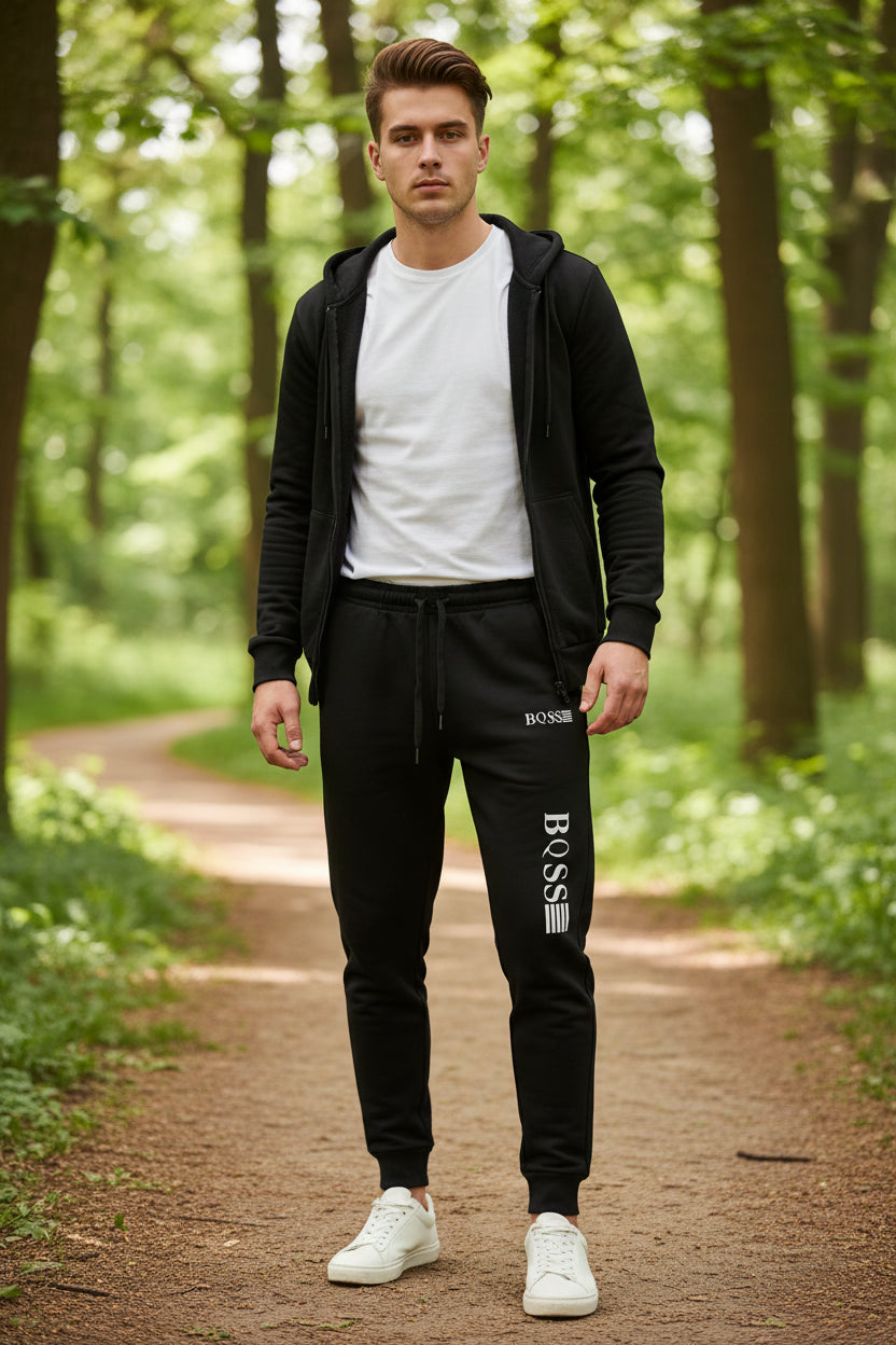 Black sweatpants with 'BOSS' logo on a white background