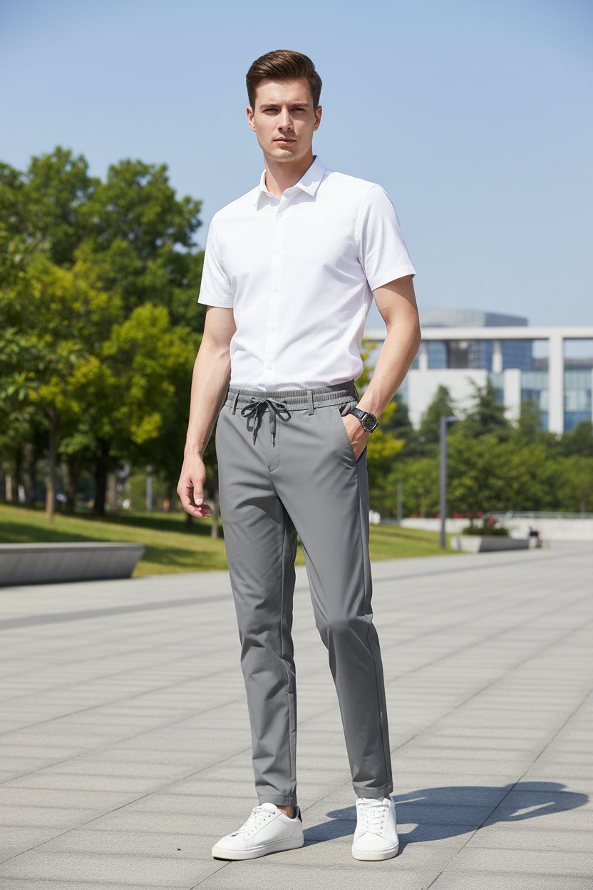 Gray pants with a drawstring waist on a white background