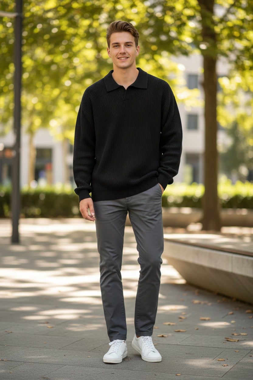 Black sweater with a collar on a white background