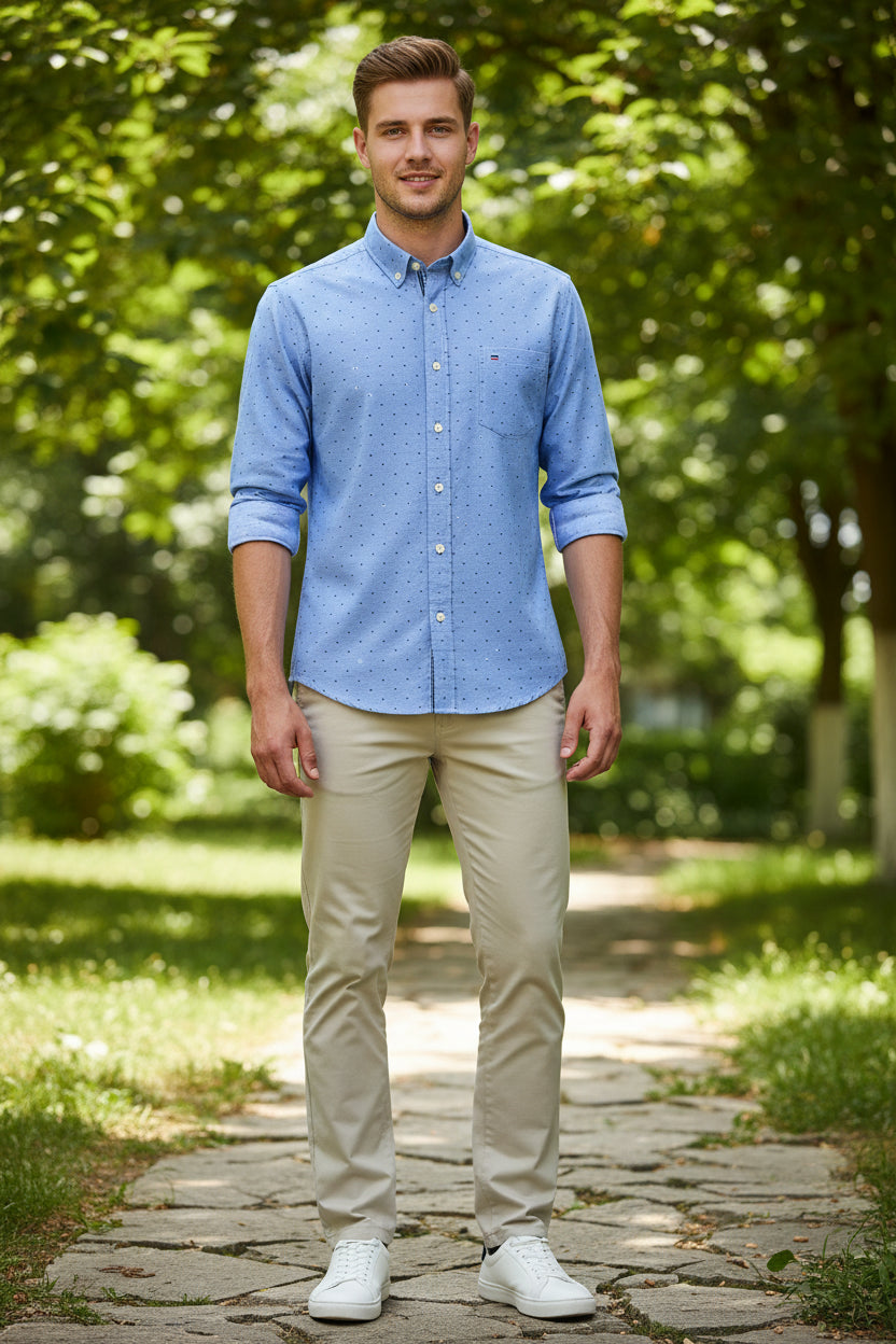 Blue patterned shirt with brand logo on a white background