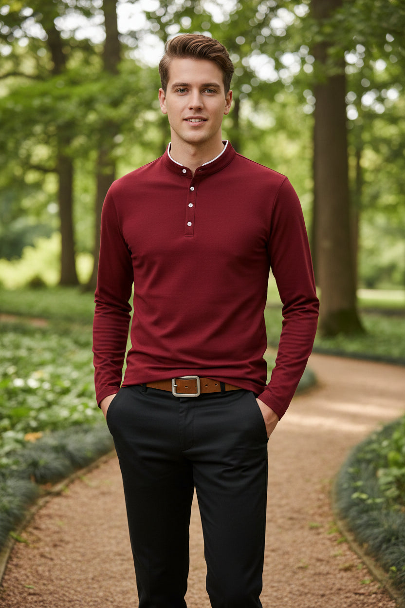 Red long-sleeve shirt worn by a person on a gray background
