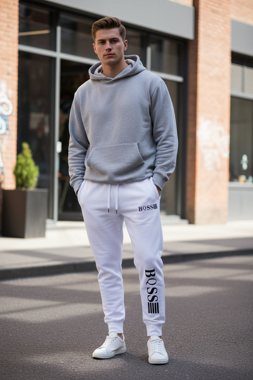 White sweatshirt and pants with 'BOSS' logo on a white background