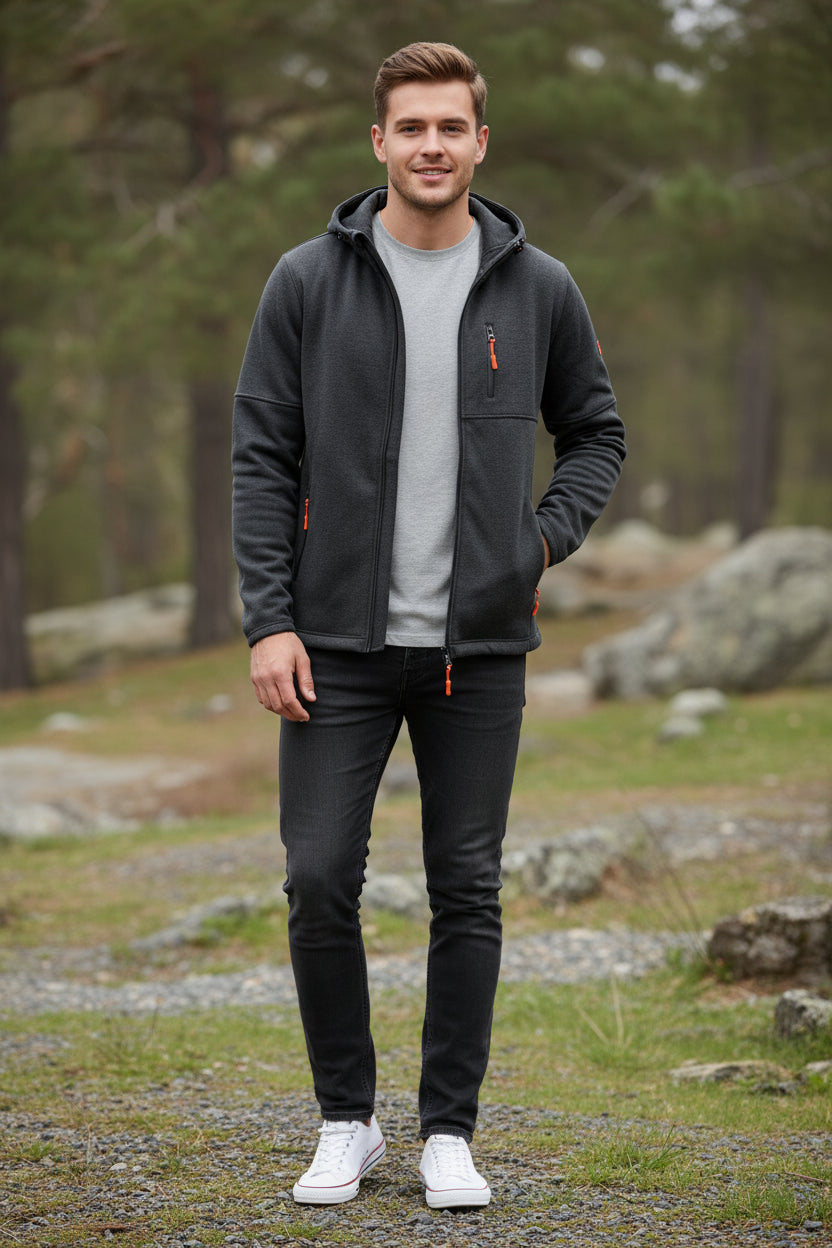 Dark gray jacket with orange zippers on a white background