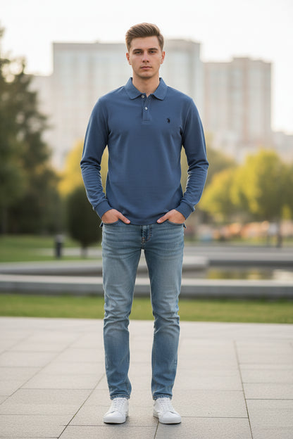 Blue long-sleeve polo shirt on a rack with other colored shirts in the background