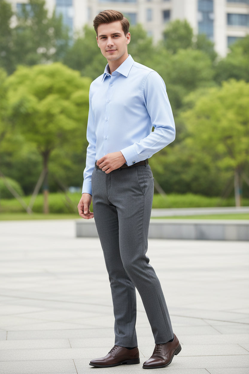 Light blue dress shirt with cufflinks on a white background