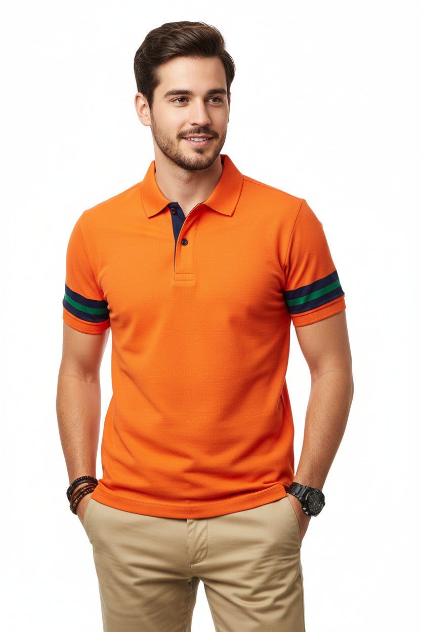 Orange polo shirt with black accents worn by a person on a white background