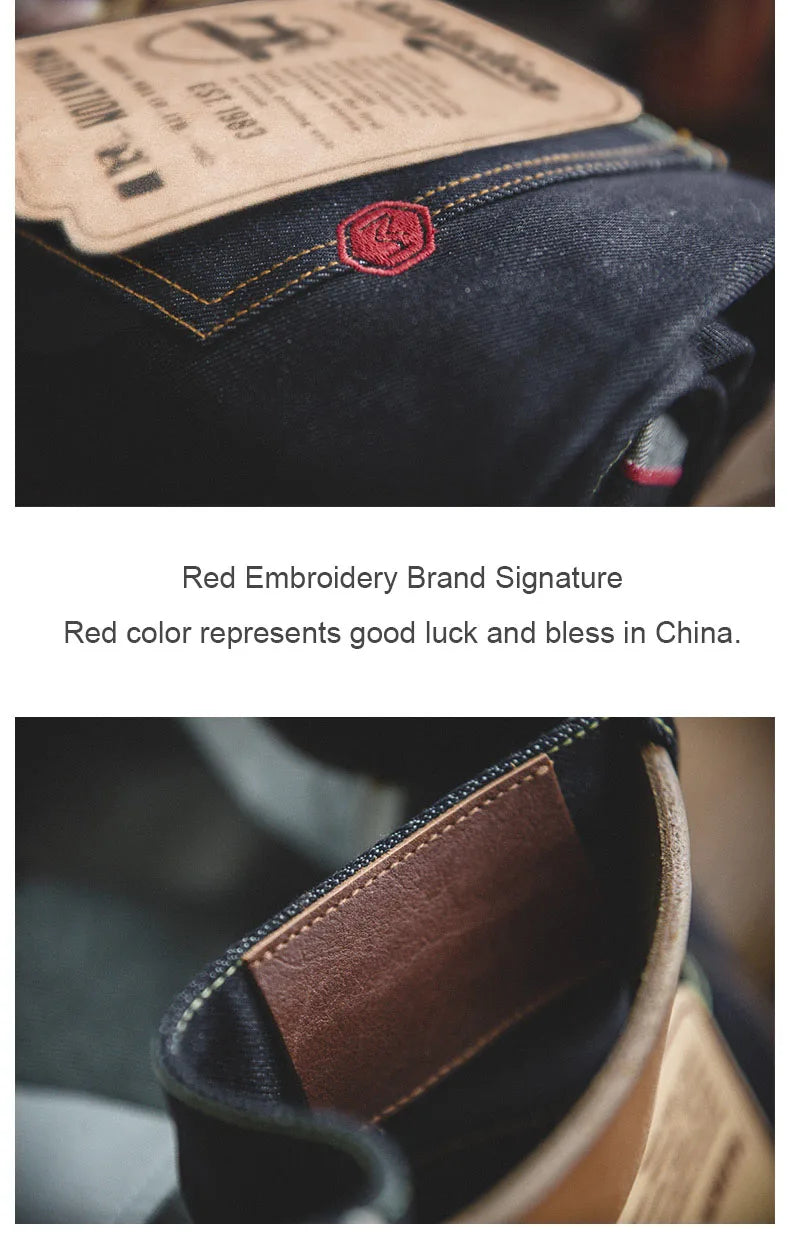 Close-up of denim fabric with red embroidery and brand label, emphasizing red color significance.