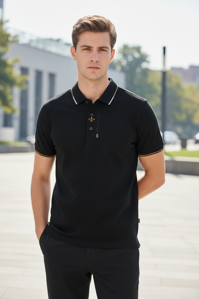 Black polo shirt with brand logo on a gray background