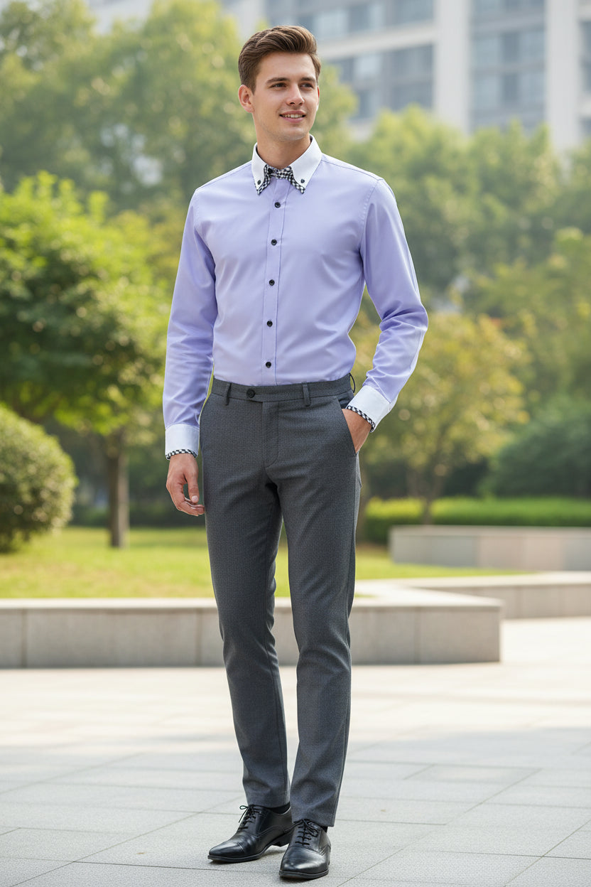 Folded light purple dress shirt with checkered inside collar on a gray background