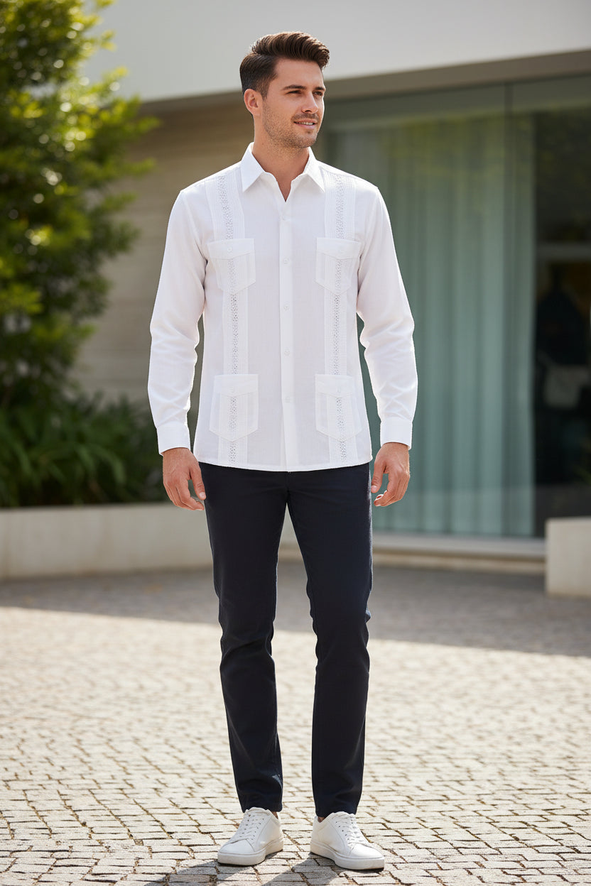 White dress shirt with embroidery  a Young man wearing it outside