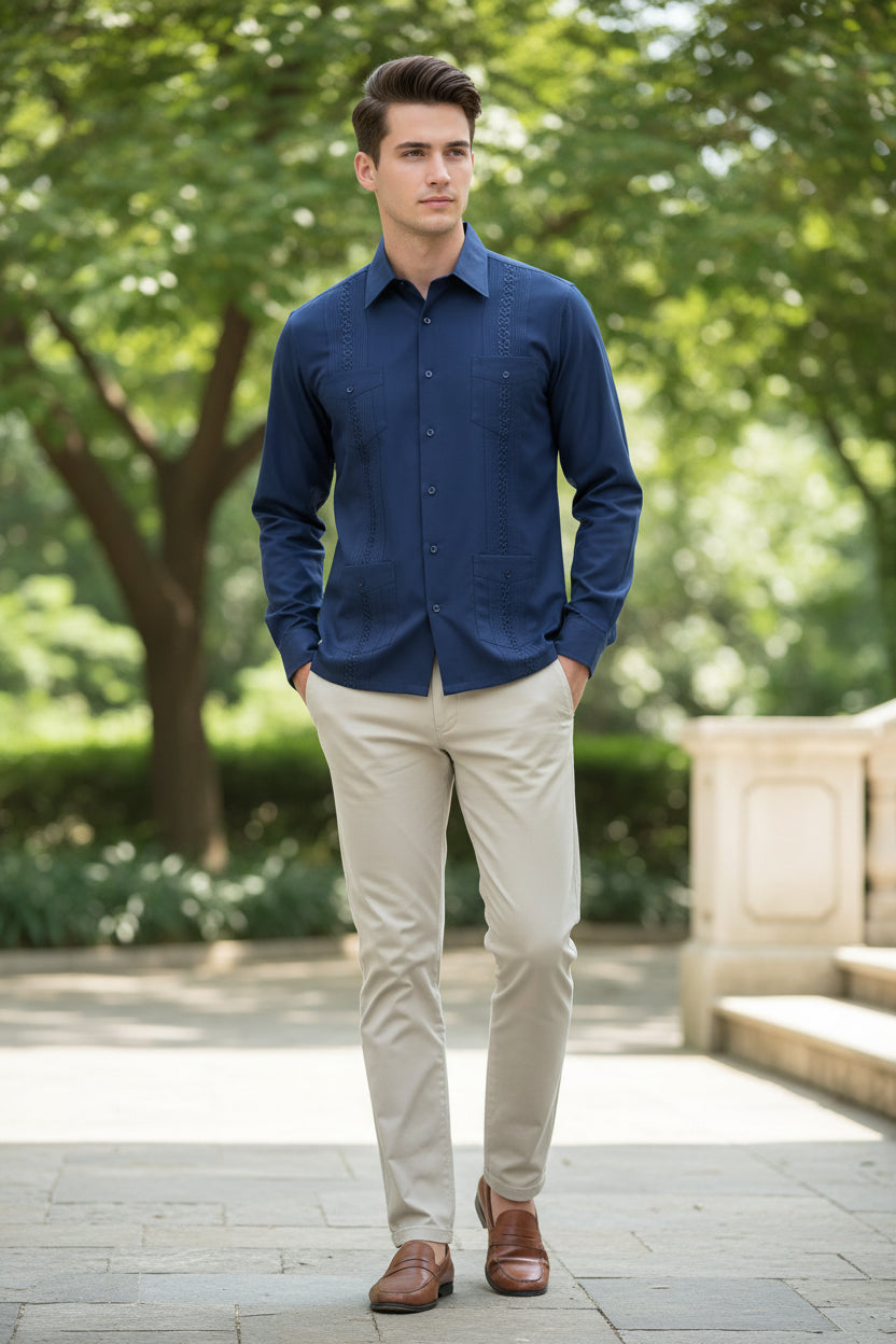 Blue embroidered shirt  a Young man wearing it outside