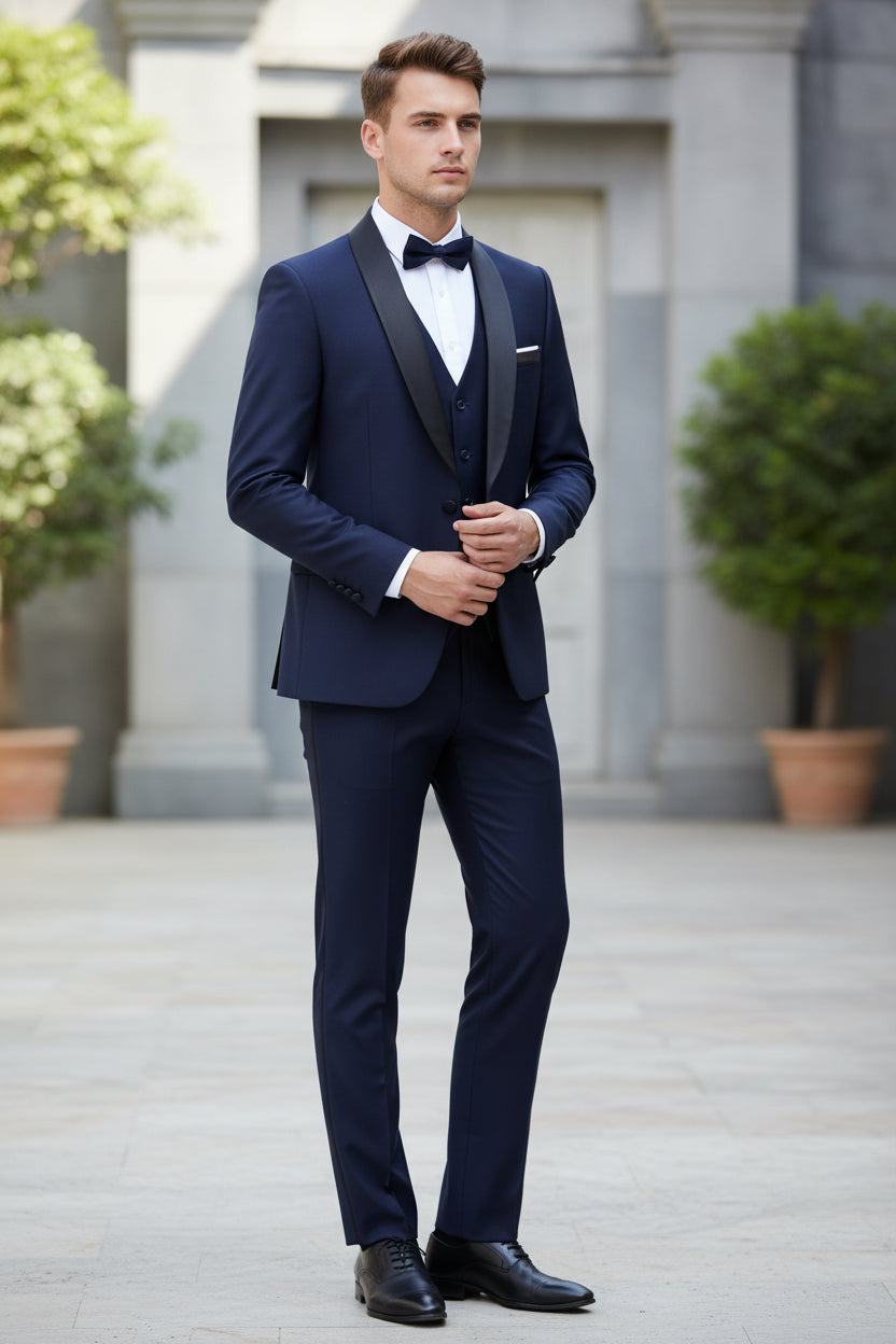 Navy blue suit with jacket, vest, and pants on a white background