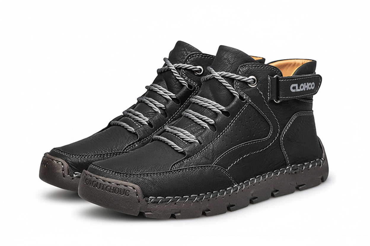 Black high-top sneakers with white laces on a white background